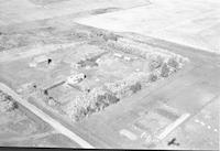 Aerial photograph of a farm near Ruddell, SK (15-42-14-W3)
