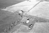 Aerial photograph of a farm in Saskatchewan (1-42-14-W3)