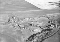 Aerial photograph of a farm in Saskatchewan (1-42-14-W3)