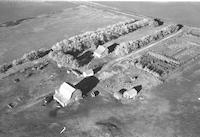 Aerial photograph of a farm in Saskatchewan (8-42-14-W3)