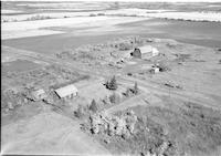 Aerial photograph of a farm in Saskatchewan (1-42-16-W3)