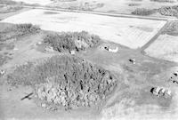 Aerial photograph of a farm near North Battleford, SK (26-43-14-W3)