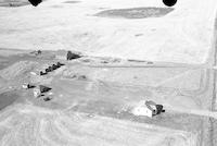 Aerial photograph of a farm near North Battleford, SK (35-43-14-W3)