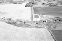 Aerial photograph of a farm near North Battleford, SK (36-43-14-W3)