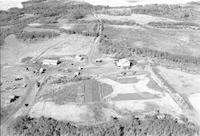 Aerial photograph of a farm in Saskatchewan (43-14-W3)