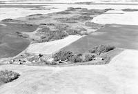 Aerial photograph of a farm in Saskatchewan (10-43-14-W3)