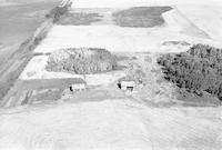 Aerial photograph of a farm in Saskatchewan (43-14-W3)