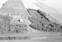 Aerial photograph of a farm in Saskatchewan (43-15-W3)