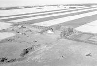 Aerial photograph of a farm in Saskatchewan (43-15-W3)