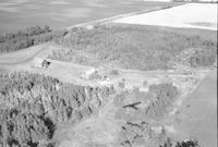 Aerial photograph of a farm in Saskatchewan (24-43-15-W3)