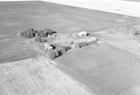 Aerial photograph of a farm in Saskatchewan (14-43-15-W3)