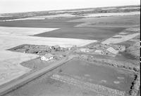 Aerial photograph of a farm near North Battleford, SK (43-17-W3)