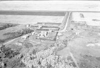 Aerial photograph of a farm in Saskatchewan (48-18-W3)