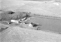 Aerial photograph of a farm in Saskatchewan (30-43-21-W3)