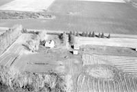 Aerial photograph of a farm in Saskatchewan (31-43-21-W3)