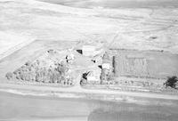 Aerial photograph of a farm near Prince, SK (22-46-17-W3)