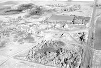 Aerial photograph of a farm in Saskatchewan (30-46-17-W3)