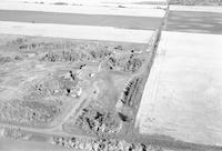 Aerial photograph of a farm in Saskatchewan (31-46-17-W3)