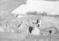 Aerial photograph of a farm near Meota, SK (46-18-W3)