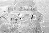 Aerial photograph of a farm near Meota, SK (46-18-W3)