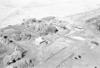 Aerial photograph of a farm near Meota, SK (47-18-W3)