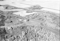 Aerial photograph of a farm near Meota, SK (47-18-W3)