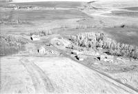 Aerial photograph of a farm in Saskatchewan (48-18-W3)