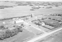 Aerial photograph of a farm in Saskatchewan (41-8-W3)