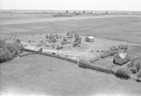 Aerial photograph of a farm in Saskatchewan (44-7-W3)