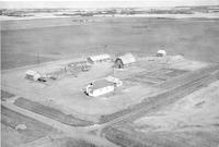 Aerial photograph of a farm in Saskatchewan (30-44-7-W3)