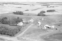 Aerial photograph of a farm in Saskatchewan (32-44-7-W3)