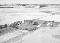 Aerial photograph of a farm in Saskatchewan (30-44-7-W3)