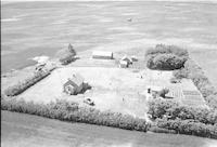 Aerial photograph of a farm in Saskatchewan (11-44-7-W3)