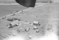 Aerial photograph of a farm in Saskatchewan (6-44-7-W3)