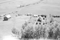 Aerial photograph of a farm in Saskatchewan (6-44-7-W3)