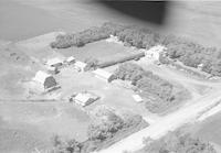 Aerial photograph of a farm in Saskatchewan (26-44-7-W3)