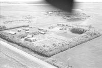 Aerial photograph of a farm in Saskatchewan (30-44-7-W3)