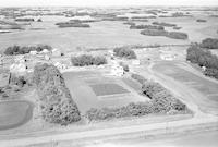 Aerial photograph of a farm near Speers, SK (43-11-W3)