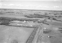 Aerial photograph of a farm near Meadow Lake, SK