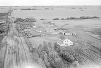 Aerial photograph of a farm near Maidstone, SK (47-23-W3)