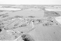 Aerial photograph of a farm near Mervin, SK (32-50-20-W3)