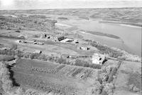 Aerial photograph of a farm near North Battleford, SK (16-45-17-W3)