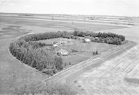 Aerial photograph of a farm near Wilkie, SK (14-40-19-W3)