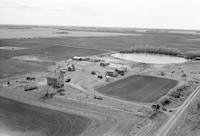 Aerial photograph of a farm near Maymont, SK (41-12-W3)