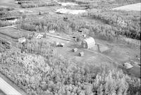 Aerial photograph of a farm near Turtleford, SK (51-20-W3)