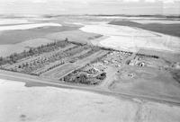 Aerial photograph of a farm near Kerrobert, SK (34-21-W3)