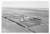 Aerial photograph of a farm in Saskatchewan (44-12-W3)